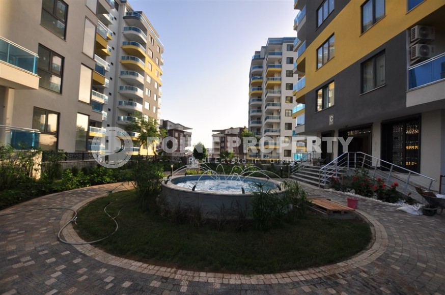 Small new apartment with fine finishing 500 meters from the beach, in the center of Mahmutlar-id-6912-photo-19