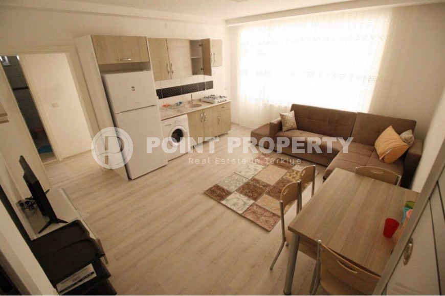 4-storey building with six apartments and a cafe on the 1st floor, in the center of Alanya-id-6917-photo-2