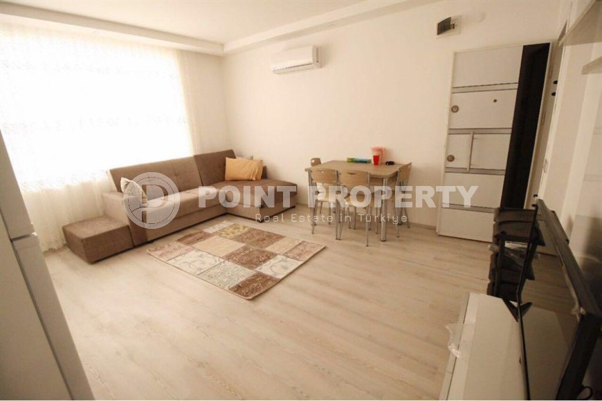 4-storey building with six apartments and a cafe on the 1st floor, in the center of Alanya-id-6917-photo-3