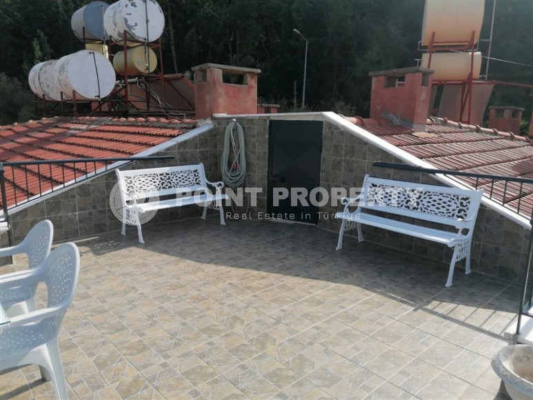 Меблированная двухуровневая квартира с видом на горы и море, в самом сердце Аланьи, в историческом районе крепости Кале-id-6920-фото-19