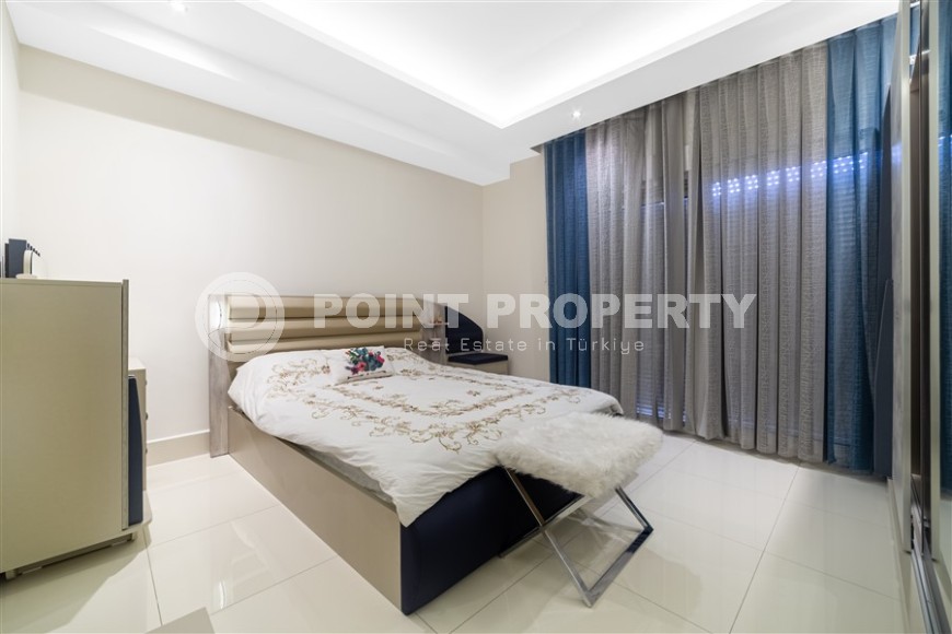 Атмосферная двухуровневая квартира с панорамным видом на море, на 9-м этаже с мансардой, в центре района Тосмур-id-6924-фото-8