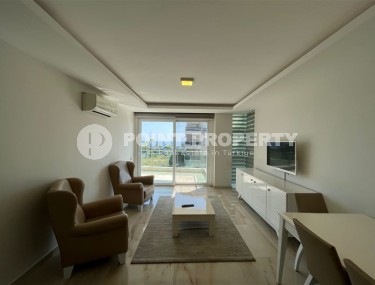 Современная квартира 1+1, общей площадью 70 м2, на берегу Средиземного моря, в центре района Кестель-id-6928-фото-2