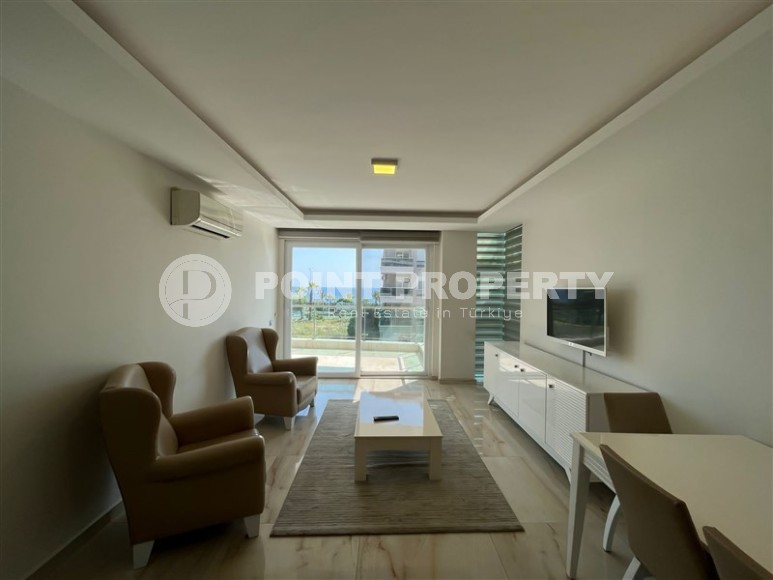 Современная квартира 1+1, общей площадью 70 м2, на берегу Средиземного моря, в центре района Кестель-id-6928-фото-2