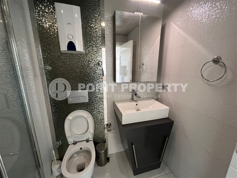 Современная квартира 1+1, общей площадью 70 м2, на берегу Средиземного моря, в центре района Кестель-id-6928-фото-6