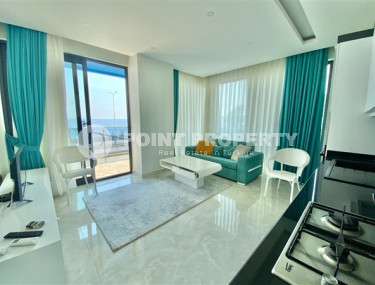 Three-room apartment, 80 m², in a premium complex on the first coastline in Mahmutlar, Alanya.-id-1542-photo-2
