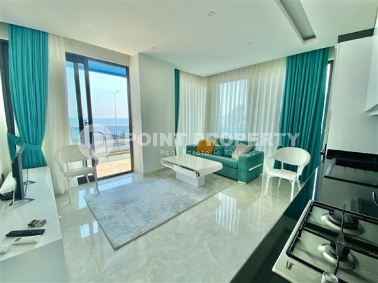 Three-room apartment, 80 m², in a premium complex on the first coastline in Mahmutlar, Alanya.-id-1542-photo-2