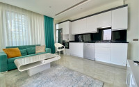Three-room apartment, 80 m², in a premium complex on the first coastline in Mahmutlar, Alanya.-id-1542-photo-3