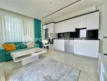 Three-room apartment, 80 m², in a premium complex on the first coastline in Mahmutlar, Alanya.-id-1542-photo-3