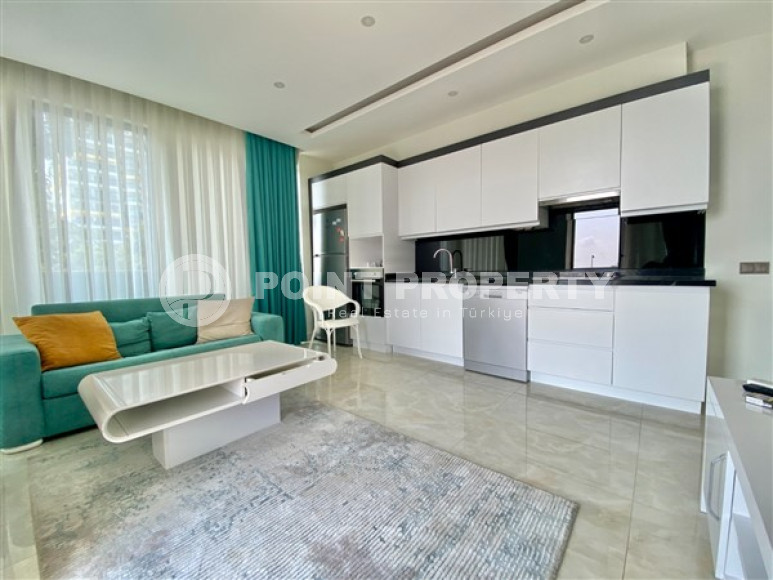 Three-room apartment, 80 m², in a premium complex on the first coastline in Mahmutlar, Alanya.-id-1542-photo-3