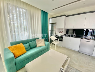 Three-room apartment, 80 m², in a premium complex on the first coastline in Mahmutlar, Alanya.-id-1542-photo-4