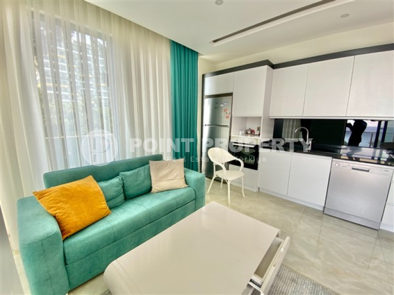 Three-room apartment, 80 m², in a premium complex on the first coastline in Mahmutlar, Alanya.-id-1542-photo-4