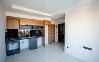 Compact 1+1 apartment with high-quality finishing 1800 meters from the sea, in the Mahmutlar area-id-6940-photo-2