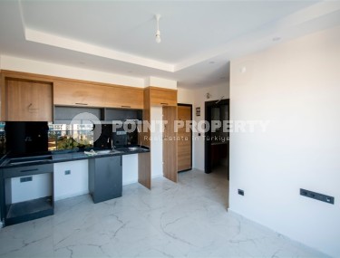 Compact 1+1 apartment with high-quality finishing 1800 meters from the sea, in the Mahmutlar area-id-6940-photo-2