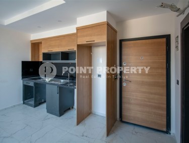 Compact 1+1 apartment with high-quality finishing 1800 meters from the sea, in the Mahmutlar area-id-6940-photo-3