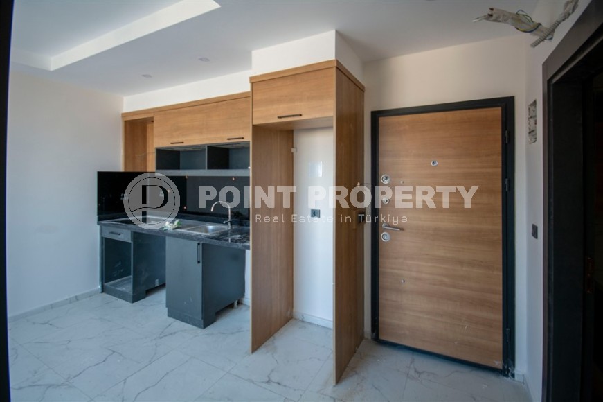 Compact 1+1 apartment with high-quality finishing 1800 meters from the sea, in the Mahmutlar area-id-6940-photo-3