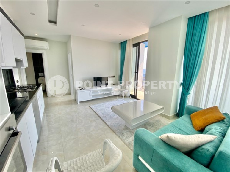 Three-room apartment, 80 m², in a premium complex on the first coastline in Mahmutlar, Alanya.-id-1542-photo-5