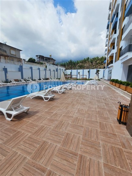 Compact 1+1 apartment with high-quality finishing 1800 meters from the sea, in the Mahmutlar area-id-6940-photo-16