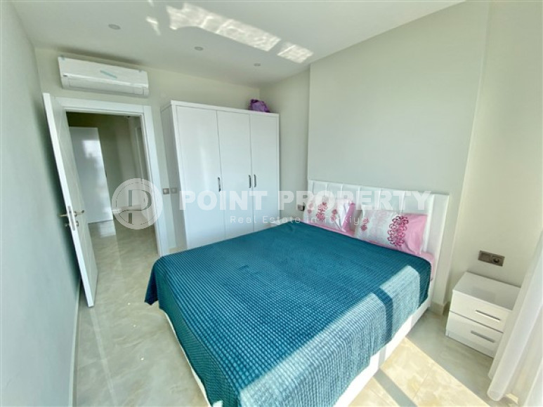 Three-room apartment, 80 m², in a premium complex on the first coastline in Mahmutlar, Alanya.-id-1542-photo-11