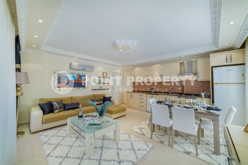 Благоустроенная квартира 2+1, общей площадью 110 м2, на 4-м этаже в центре спокойного района Аланьи - Тосмур-id-6948-фото-2