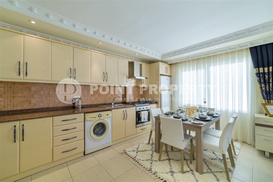 Благоустроенная квартира 2+1, общей площадью 110 м2, на 4-м этаже в центре спокойного района Аланьи - Тосмур-id-6948-фото-5