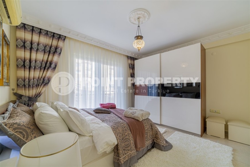 Благоустроенная квартира 2+1, общей площадью 110 м2, на 4-м этаже в центре спокойного района Аланьи - Тосмур-id-6948-фото-6