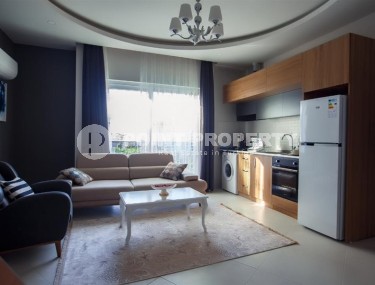 Modern apartment with furniture and household appliances, 500 meters from the sea, in the center of Mahmutlar-id-6952-photo-1