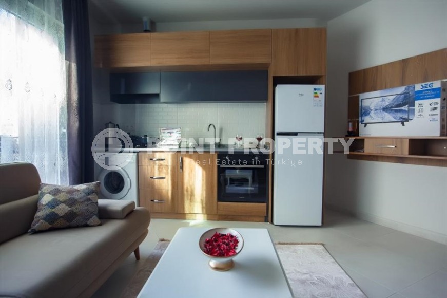 Modern apartment with furniture and household appliances, 500 meters from the sea, in the center of Mahmutlar-id-6952-photo-2