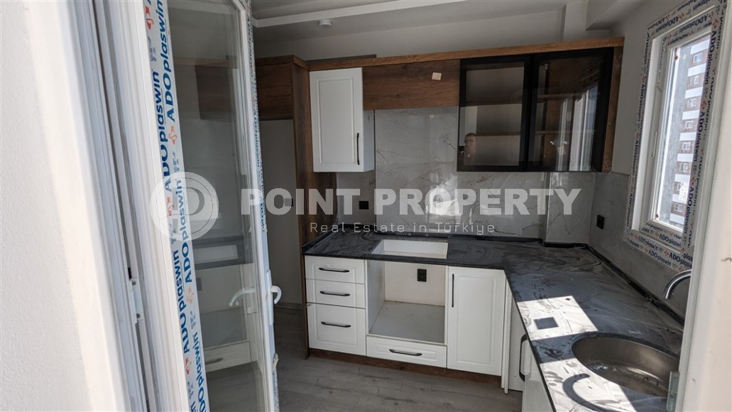 Недорогие новые квартиры в жилом комплексе, введенном в эксплуатацию в 2022 году, в популярном курортном районе Мерсина - Томюк-id-6956-фото-3