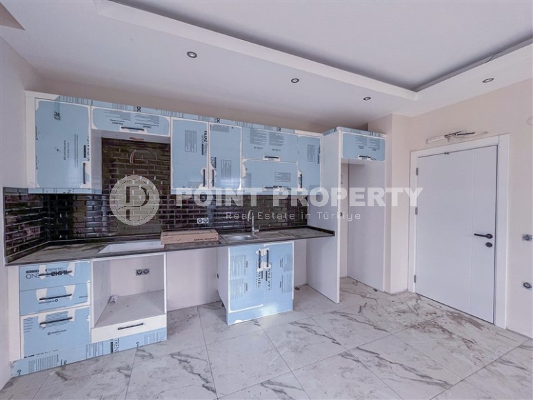 A small apartment with a fine finish one and a half kilometers from the sea, in a picturesque area of Alanya - Upper Oba-id-6965-photo-4