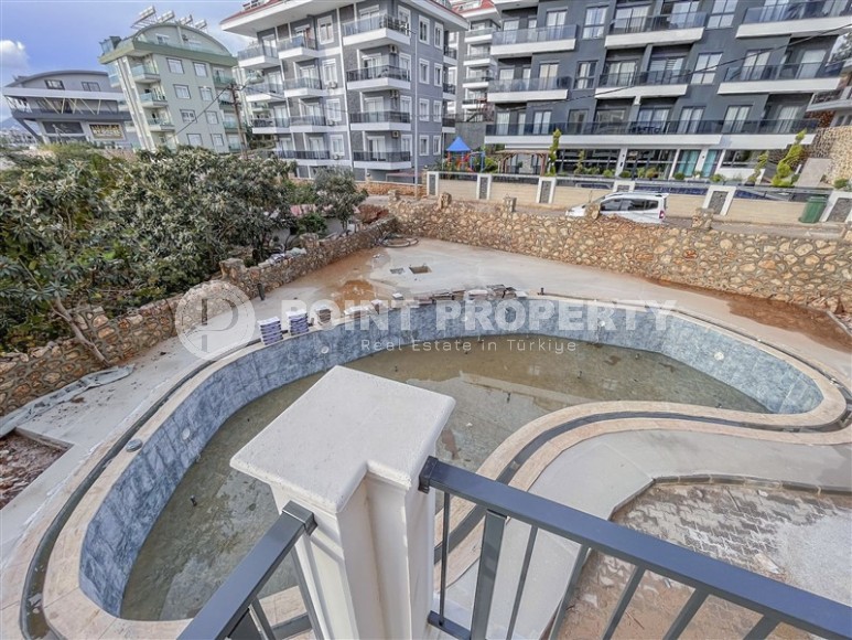 A small apartment with a fine finish one and a half kilometers from the sea, in a picturesque area of Alanya - Upper Oba-id-6965-photo-12