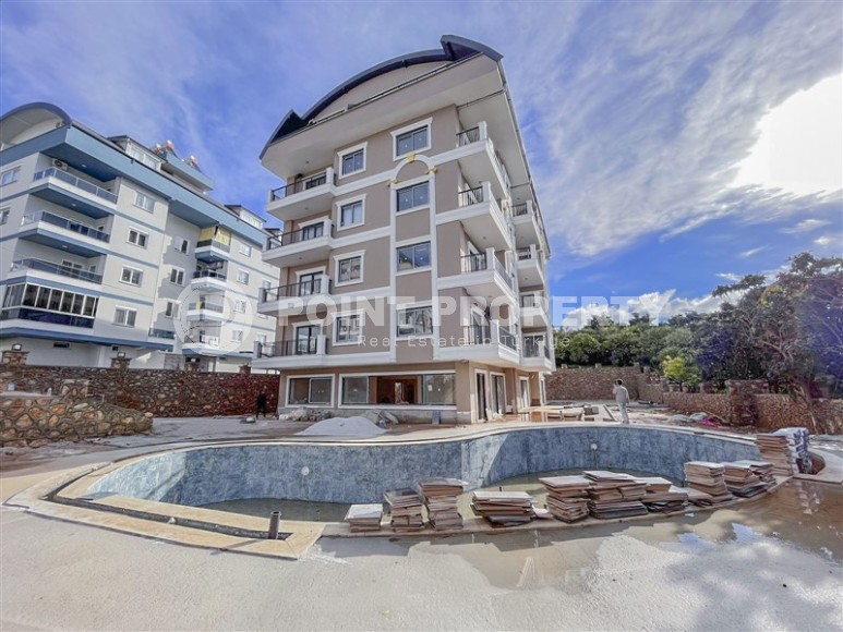 A small apartment with a fine finish one and a half kilometers from the sea, in a picturesque area of Alanya - Upper Oba-id-6965-photo-13