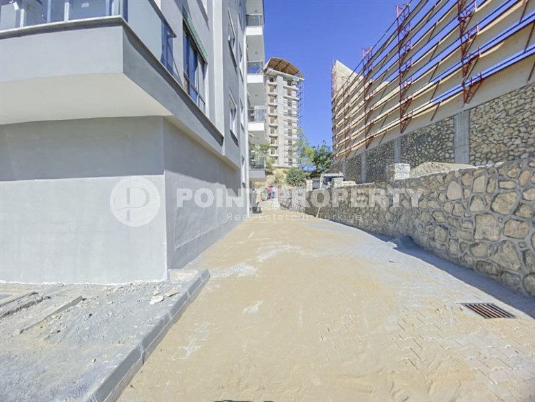 Компактная новая квартира 1+1 в двух километрах от моря, в живописном районе Аланьи - Авсаллар-id-6968-фото-12