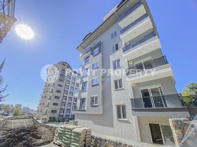 Компактная новая квартира 1+1 в двух километрах от моря, в живописном районе Аланьи - Авсаллар-id-6968-фото-13