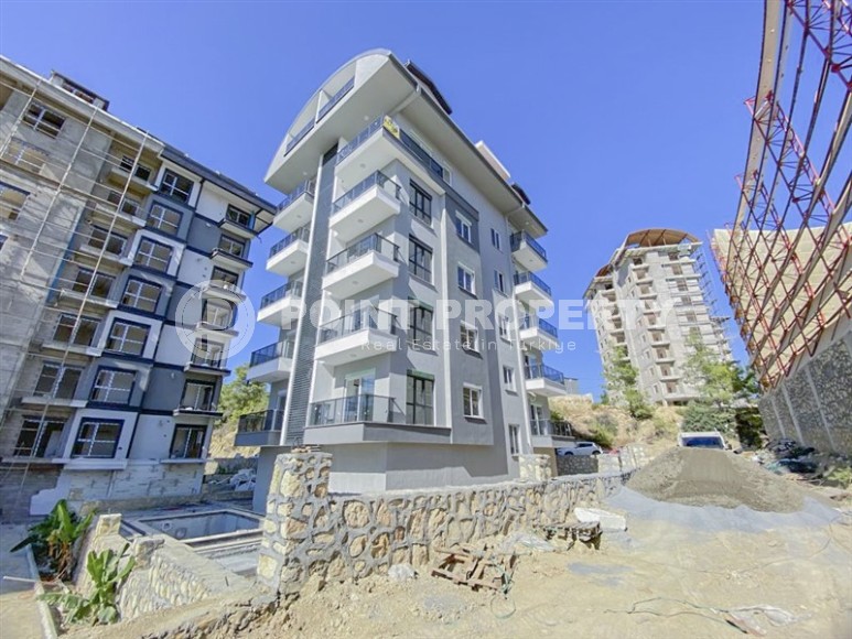 Компактная новая квартира 1+1 в двух километрах от моря, в живописном районе Аланьи - Авсаллар-id-6968-фото-14