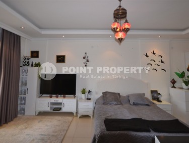 Благоустроенная студия, общей площадью 50 м2, на 1-м этаже, в центре района Авсаллар-id-6972-фото-4