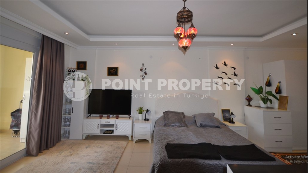 Благоустроенная студия, общей площадью 50 м2, на 1-м этаже, в центре района Авсаллар-id-6972-фото-4