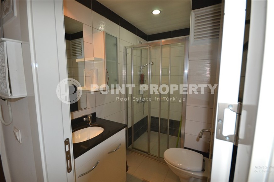 Благоустроенная студия, общей площадью 50 м2, на 1-м этаже, в центре района Авсаллар-id-6972-фото-5