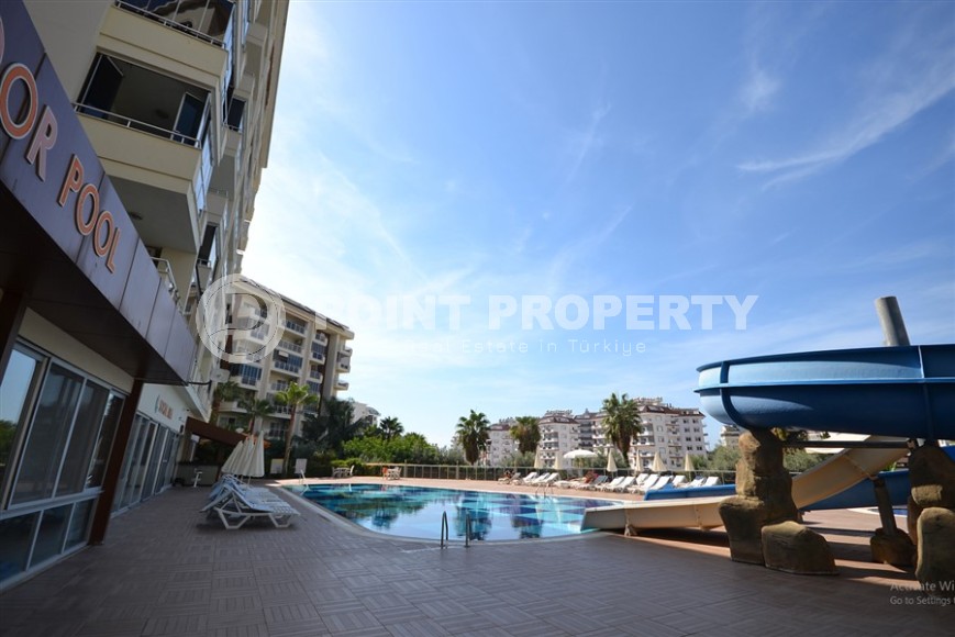 Благоустроенная студия, общей площадью 50 м2, на 1-м этаже, в центре района Авсаллар-id-6972-фото-12