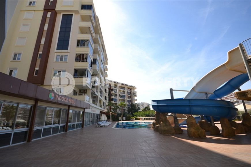 Благоустроенная студия, общей площадью 50 м2, на 1-м этаже, в центре района Авсаллар-id-6972-фото-15