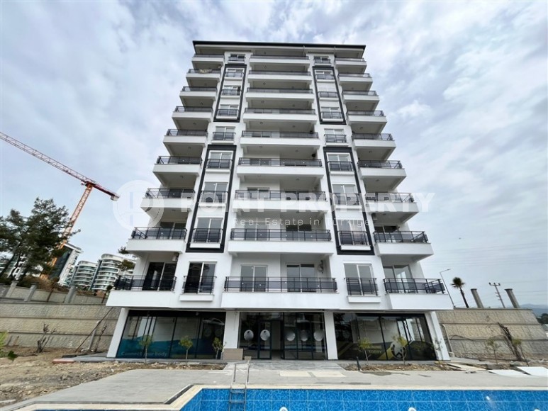 Small 1+1 apartment on the 8th floor in a residence at the final stage of construction.-id-4595-photo-1