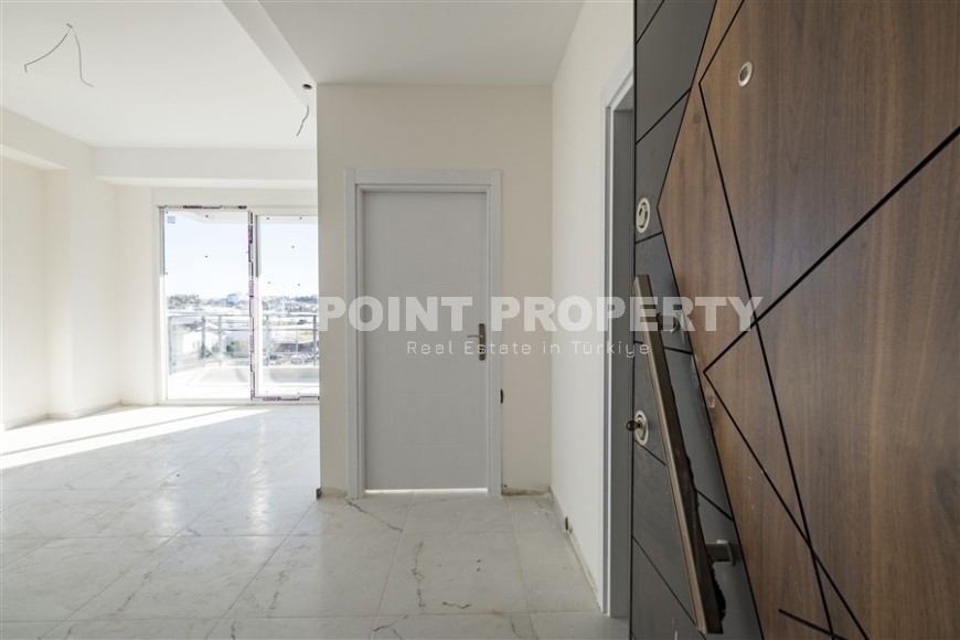 Small 1+1 apartment on the 8th floor in a residence at the final stage of construction.-id-4595-photo-6