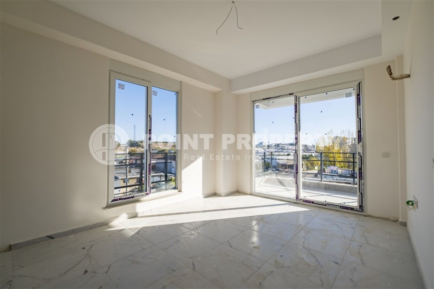 Small 1+1 apartment on the 8th floor in a residence at the final stage of construction.-id-4595-photo-7