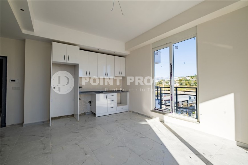 Small 1+1 apartment on the 8th floor in a residence at the final stage of construction.-id-4595-photo-8