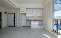 Small 1+1 apartment on the 8th floor in a residence at the final stage of construction.-id-4595-photo-9