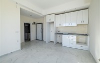 Small 1+1 apartment on the 8th floor in a residence at the final stage of construction.-id-4595-photo-10