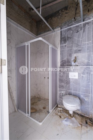 Small 1+1 apartment on the 8th floor in a residence at the final stage of construction.-id-4595-photo-11