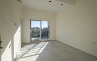 Small 1+1 apartment on the 8th floor in a residence at the final stage of construction.-id-4595-photo-12