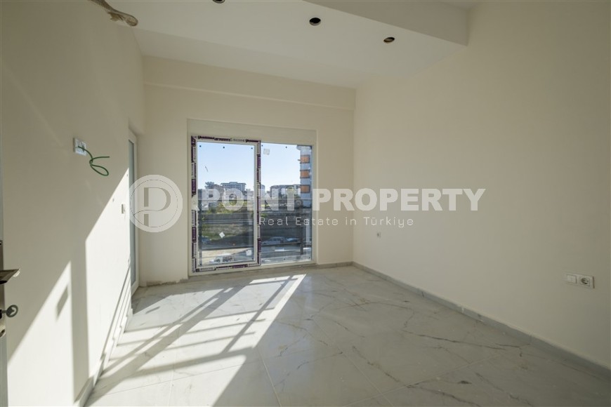 Small 1+1 apartment on the 8th floor in a residence at the final stage of construction.-id-4595-photo-12