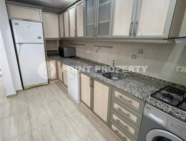 Ready-to-move-in apartment on the 1st floor in a residence built in 2006, in the center of Alanya-id-6977-photo-4