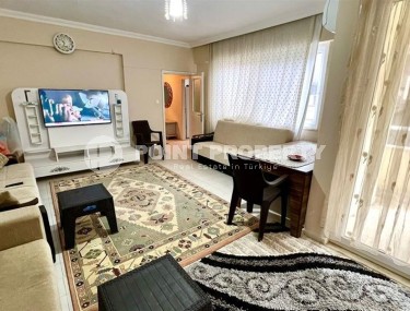 Comfortable apartment 2+1 on the 1st floor in a building built in 2002, in the center of Mahmutlar district-id-6978-photo-1